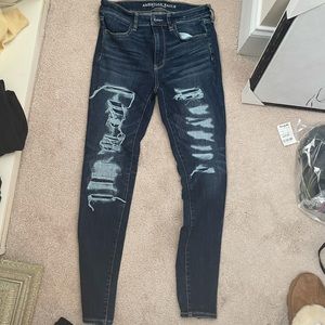 Hi-Rise Dark Wash Ripped Jegging